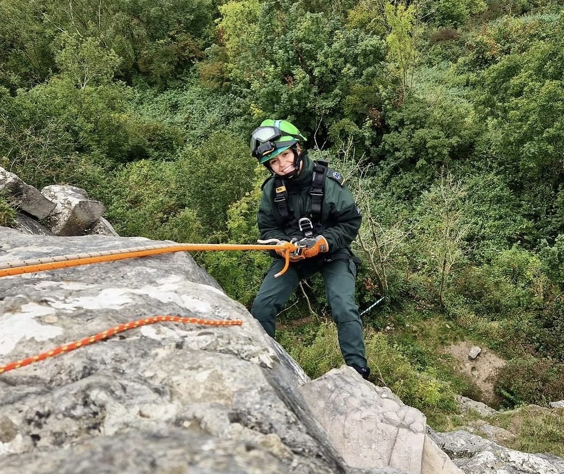Zoe abseiling in SWAH kit